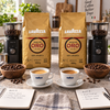 Zwei Lavazza Packungen mit unterschiedlich zubereitetem Espresso im direkten Vergleich