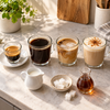 Espresso, Cappuccino und Latte Macchiato im Kalorienvergleich mit Milch, Zucker und Sirup