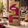 Lavazza Tierra Bio Intenso Espresso in einer Glastasse mit goldbrauner Crema