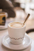 Café Crème in einer Tasse mit goldbrauner Schümli-Crema – klassischer Schweizer Kaffee, mild und cremig serviert.
